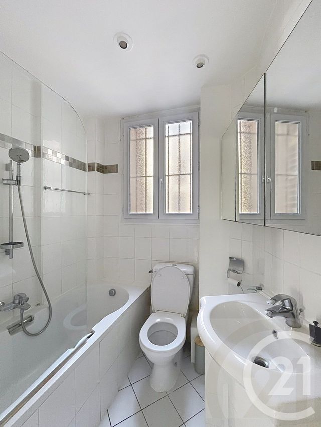 Appartement F4 à vendre - 4 pièces - 72.41 m2 - PARIS - 75018 - ILE-DE-FRANCE - Century 21 Joffrin Immobilier
