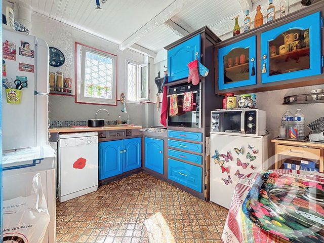 Afficher la photo en grand Appartement F4 à vendre - 4 pièces - 82.85 m2 - PARIS - 75018 - ILE-DE-FRANCE - Century 21 Joffrin Immobilier