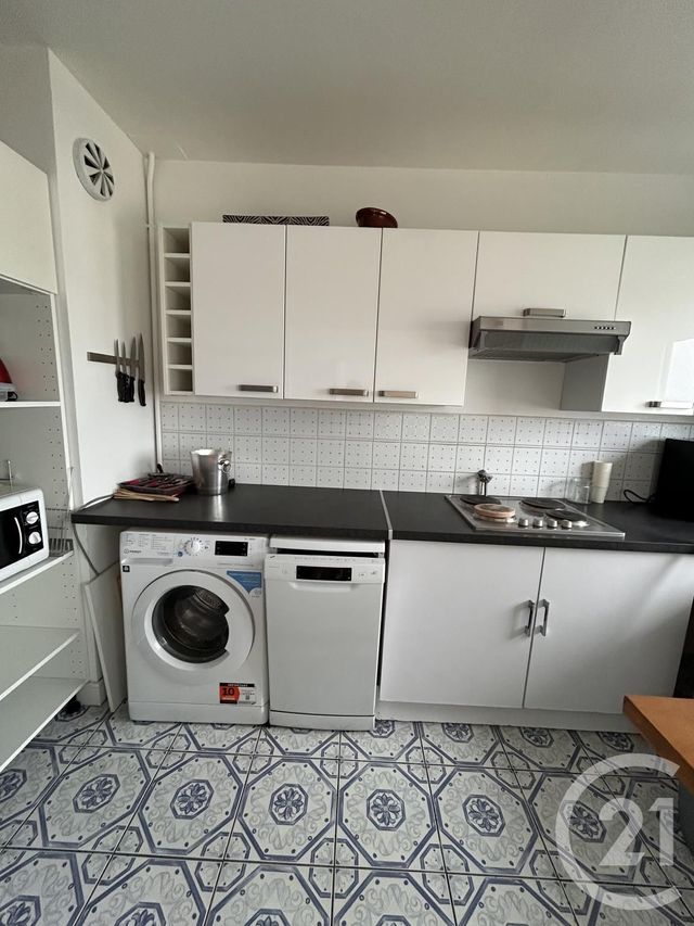Appartement T2 à louer - 2 pièces - 56.51 m2 - PARIS - 75018 - ILE-DE-FRANCE - Century 21 Joffrin Immobilier