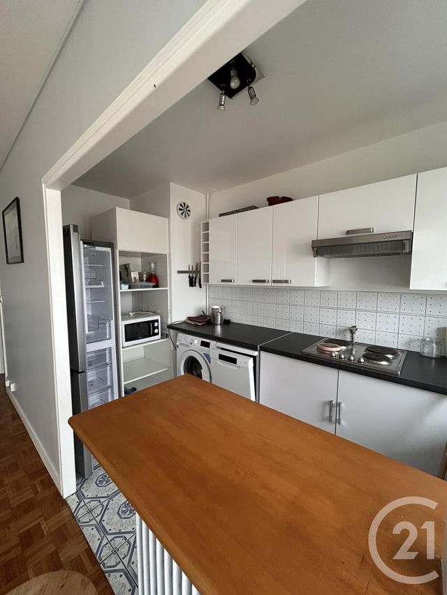Appartement T2 à louer - 2 pièces - 56.51 m2 - PARIS - 75018 - ILE-DE-FRANCE - Century 21 Joffrin Immobilier