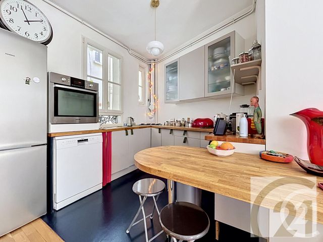 Appartement Duplex à vendre - 6 pièces - 116.0 m2 - PARIS - 75018 - ILE-DE-FRANCE - Century 21 Joffrin Immobilier