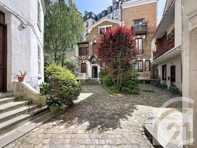 Appartement Duplex à vendre - 6 pièces - 116.0 m2 - PARIS - 75018 - ILE-DE-FRANCE - Century 21 Joffrin Immobilier