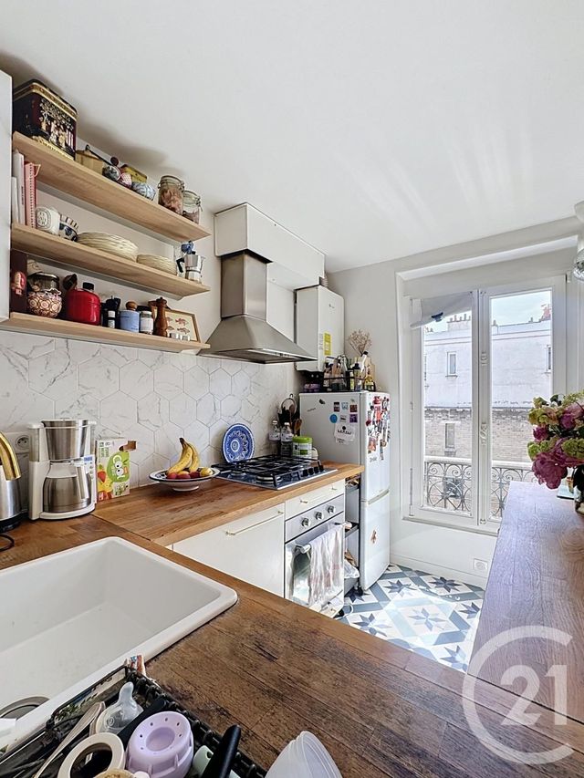 Appartement F2 à vendre - 2 pièces - 45.0 m2 - PARIS - 75018 - ILE-DE-FRANCE - Century 21 Joffrin Immobilier