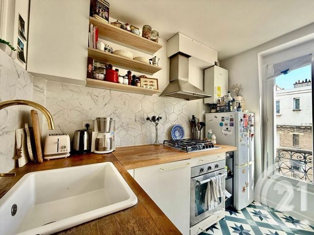 Appartement F2 à vendre - 2 pièces - 45.0 m2 - PARIS - 75018 - ILE-DE-FRANCE - Century 21 Joffrin Immobilier