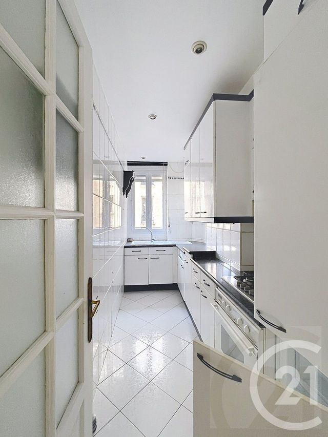 Appartement F4 à vendre - 4 pièces - 72.41 m2 - PARIS - 75018 - ILE-DE-FRANCE - Century 21 Joffrin Immobilier